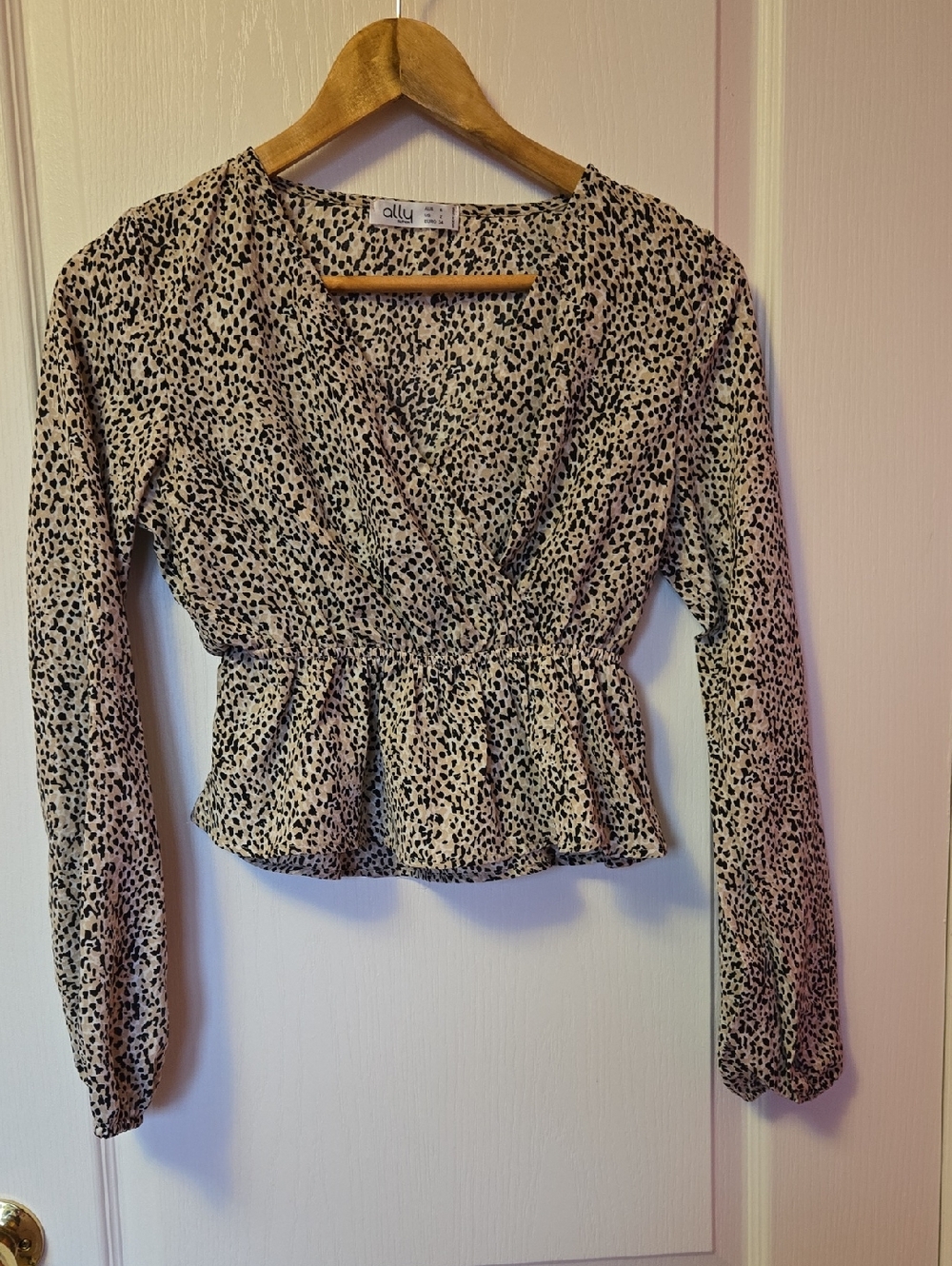 Ally Cream and Black Printed Peplum V-Neck Blouse